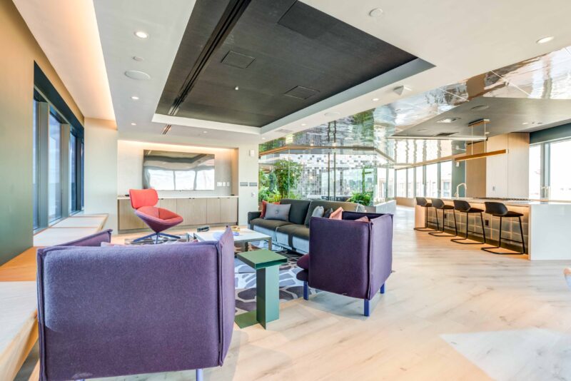 Building 2 resident lounge with seating and impluvium